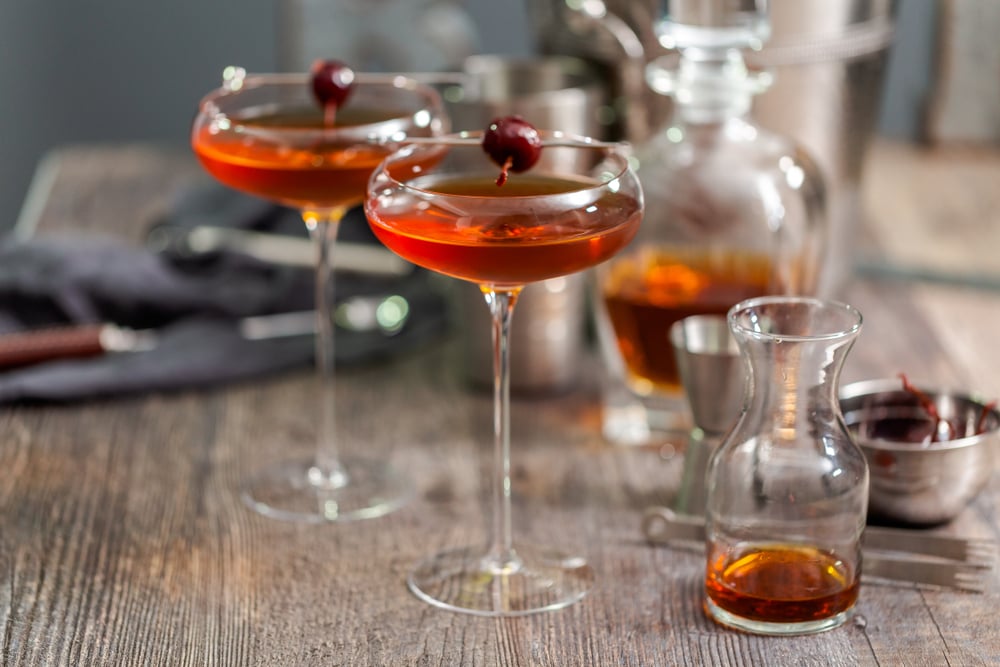 cocktail with the best bourbon for manhattan garnished with brandied cherry