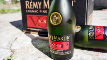 bottle of remy martin vsop cognac behind box