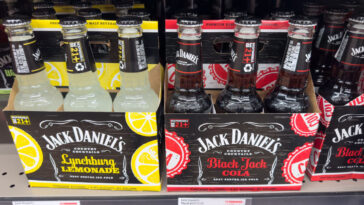 A view of several 6-packs of Jack Daniel's country cocktails, on display at a local grocery store.