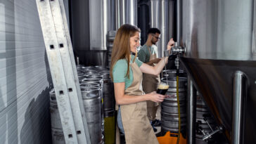 two person working at best brewpubs in houston