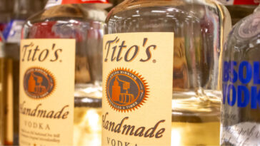 two bottles of titos vodka