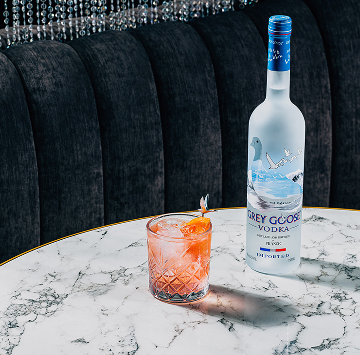 GREY GOOSE® Boardwalk Cocktail Garnish with grapefruit wedge.
