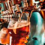 bartender-pours-draft-beer-into-the-glass