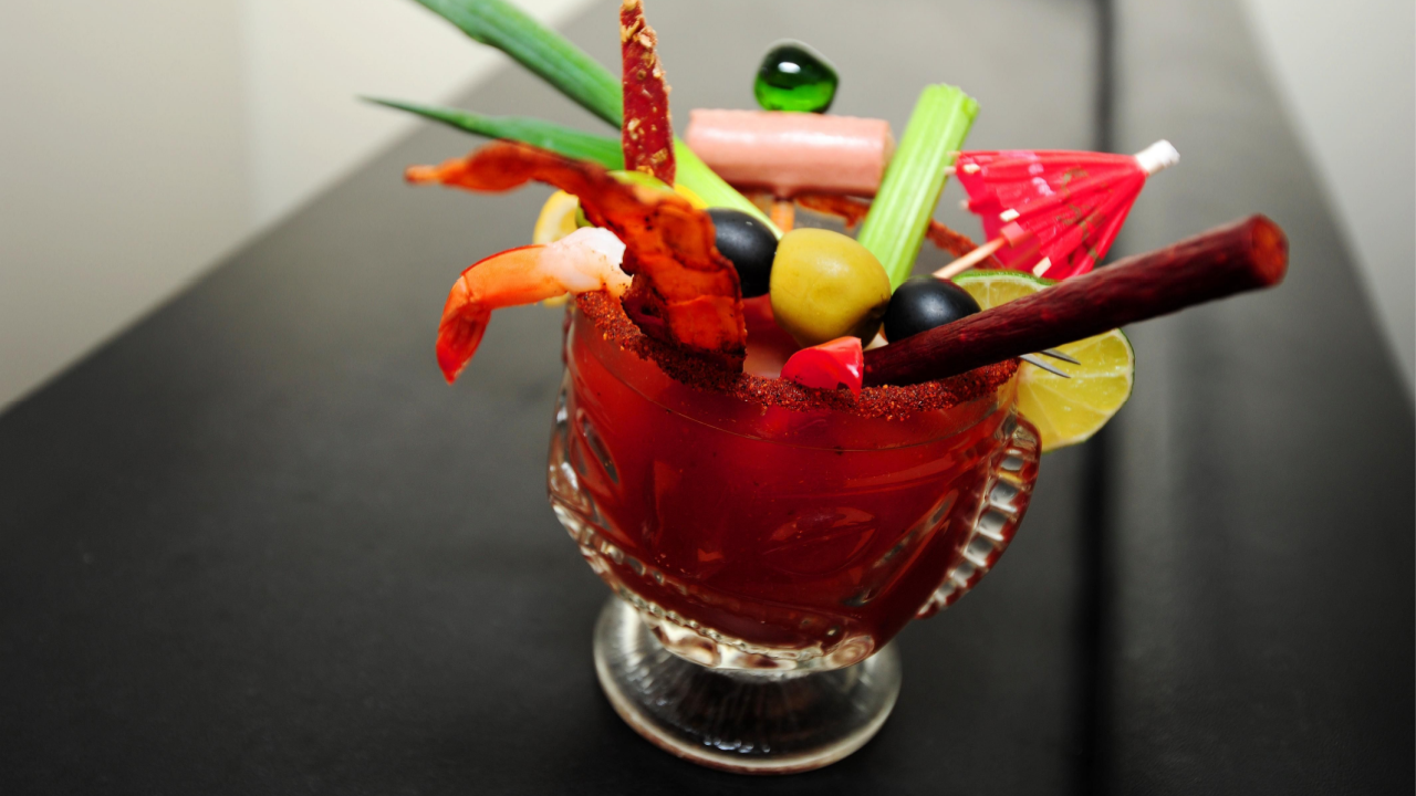 An extravagant Bloody Mary, with many assorted garnishes.