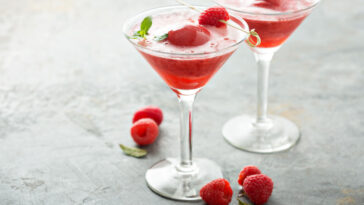 Sparkling rose and raspberry sorbet floats with fresh berries