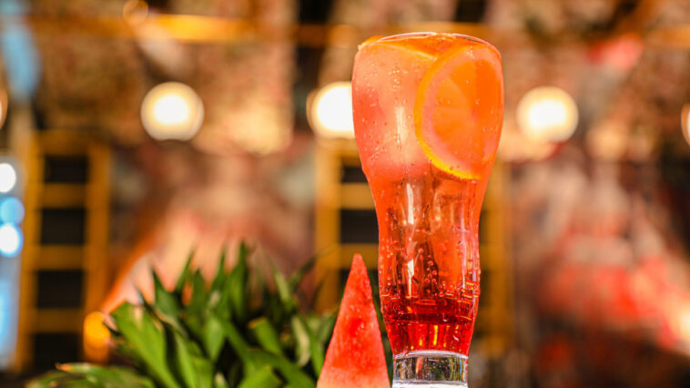 watermelon mojito with a slice of watermelon