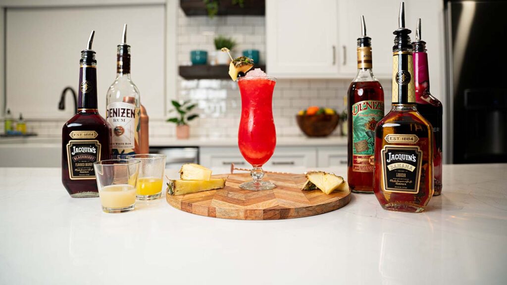30 Must-Try Summer Rum Cocktails 11 rum runner cocktail with ingredients on the background