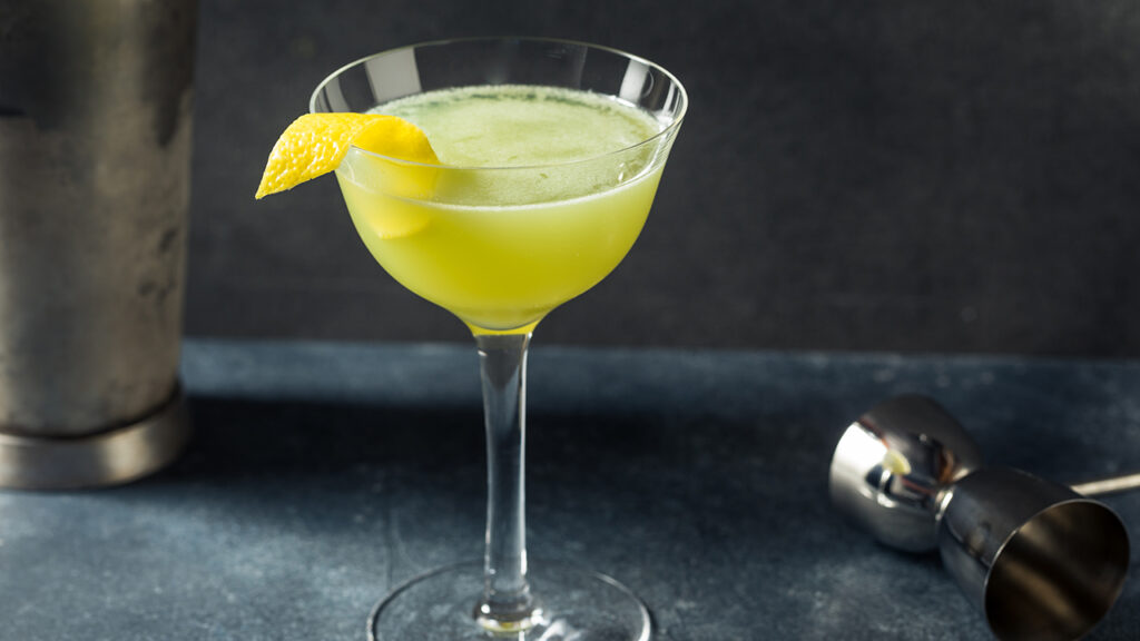 Boozy Refreshing Absinthe Necromancer Cocktail with Lemon and Gin